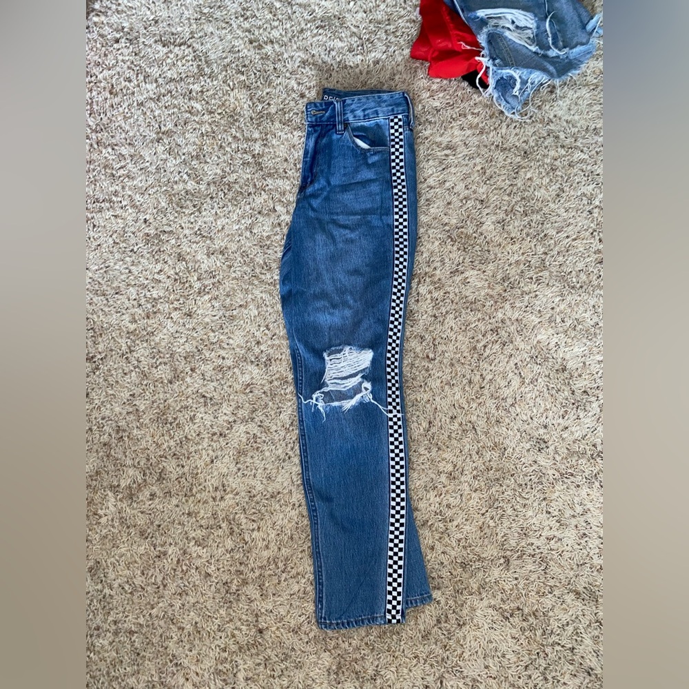 Jeans with checkered seam